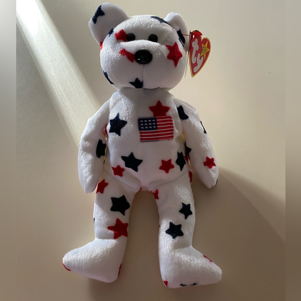 NWT BEANIE BABY - “Glory”the bear, kept in collectible case.